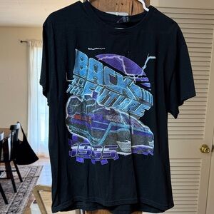 Back to the Future 1985 Retro Graphic Tee - Black with Blue & Purple Print